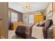 Cozy bedroom with double bed and wood furniture at 4525 S Deck Rd, Gosport, IN 47433