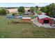 Aerial view of a house, pool, and outbuildings on a large lot at 4525 S Deck Rd, Gosport, IN 47433