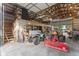 Workshop with ATV, tractor, and ample storage at 4525 S Deck Rd, Gosport, IN 47433