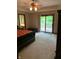 Main bedroom with sliding door to deck access at 466 Sycamore Ridge Ct, Avon, IN 46123