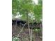 Two story house nestled in a heavily wooded area at 466 Sycamore Ridge Ct, Avon, IN 46123