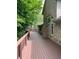 Large deck extending along the back of house with wooded views at 466 Sycamore Ridge Ct, Avon, IN 46123