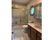 Clean bathroom with a shower/tub combo, vanity, and updated fixtures at 466 Sycamore Ridge Ct, Avon, IN 46123