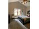 Bright bedroom featuring a large window, ceiling fan, and plush carpeting at 466 Sycamore Ridge Ct, Avon, IN 46123