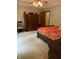 Large main bedroom with a king-size bed and access to a private deck at 466 Sycamore Ridge Ct, Avon, IN 46123