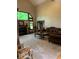 Bright living room with large windows, fireplace, and ample seating at 466 Sycamore Ridge Ct, Avon, IN 46123