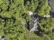 Bird's-eye view of house, deck, and surrounding trees at 5826 Winding Way Ln, Indianapolis, IN 46220