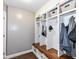 White built-in mudroom with bench and cubbies at 5826 Winding Way Ln, Indianapolis, IN 46220