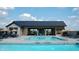 Resort-style pool with lounge chairs and umbrellas at 1676 Solebar Way, Westfield, IN 46074