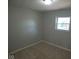 Cozy bedroom with a window and neutral wall colors at 109 Bixler Rd, Indianapolis, IN 46227