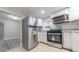 Stainless steel refrigerator in a modern kitchen at 71 Cleveland St, Columbus, IN 47201