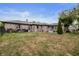 Large backyard with grill and firepit area at 1061 Saint Paul St, Shelbyville, IN 46176