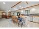 Modern kitchen with white cabinets, wood countertops, and a kitchen island at 1061 Saint Paul St, Shelbyville, IN 46176