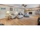 Living Room with fireplace, comfortable seating, and hardwood floors at 1061 Saint Paul St, Shelbyville, IN 46176