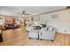 Spacious living room featuring hardwood floors, comfortable seating, and large windows at 1061 Saint Paul St, Shelbyville, IN 46176