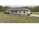 Ranch style home with attached two-car garage and landscaped yard at 5391 Neff Ln, Mooresville, IN 46158