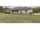 Ranch style home with covered porch and landscaping at 5391 Neff Ln, Mooresville, IN 46158