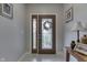 Bright entryway with wood door and decorative glass at 5391 Neff Ln, Mooresville, IN 46158