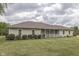 Ranch style home with covered porch and landscaping at 5391 Neff Ln, Mooresville, IN 46158