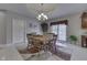 Bright dining room features a wood table with chairs and access to the patio at 5391 Neff Ln, Mooresville, IN 46158