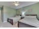 Guest bedroom with two twin beds and green walls at 5391 Neff Ln, Mooresville, IN 46158