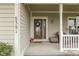 Inviting front porch with a wreath and comfortable seating at 5391 Neff Ln, Mooresville, IN 46158