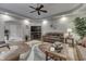 Spacious living room with hardwood floors, fireplace, and ample seating at 5391 Neff Ln, Mooresville, IN 46158