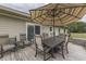 Deck with table, chairs, and umbrella at 5391 Neff Ln, Mooresville, IN 46158
