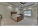 Spacious bedroom with wood furniture and a ceiling fan at 5391 Neff Ln, Mooresville, IN 46158