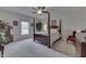 Spacious bedroom with a post bed, dresser, and window at 5391 Neff Ln, Mooresville, IN 46158