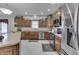 Kitchen features stainless steel appliances and an island at 5391 Neff Ln, Mooresville, IN 46158