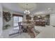 Eat-in kitchen with an island and stainless steel appliances at 5391 Neff Ln, Mooresville, IN 46158