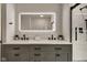 Bathroom with double vanity, quartz countertop, and walk-in shower at 1229 N Keystone Ave, Indianapolis, IN 46201