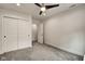 Spacious bedroom with ceiling fan and double-door closet at 1229 N Keystone Ave, Indianapolis, IN 46201