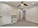 Spacious bedroom featuring ceiling fan, carpet, and ample closet space at 1229 N Keystone Ave, Indianapolis, IN 46201
