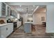 Modern kitchen with white cabinets, stainless steel appliances and an island at 1229 N Keystone Ave, Indianapolis, IN 46201