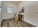 Cozy home office with hardwood floors and a comfy chair at 1229 N Keystone Ave, Indianapolis, IN 46201