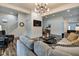 Bright living room features hardwood floors, comfy seating, and stylish decor at 1229 N Keystone Ave, Indianapolis, IN 46201