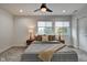 Cozy bedroom with two nightstands and a ceiling fan at 1229 N Keystone Ave, Indianapolis, IN 46201