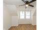 Charming bedroom with hardwood floors and two windows at 309 N Lasalle St, Indianapolis, IN 46201