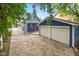 Detachable two-car garage with a long driveway at 309 N Lasalle St, Indianapolis, IN 46201