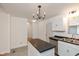 Modern kitchen with white cabinets, island, and stainless steel appliances at 309 N Lasalle St, Indianapolis, IN 46201