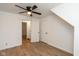 Spacious bedroom with hardwood floors and access to hallway at 309 N Lasalle St, Indianapolis, IN 46201