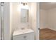 Updated bathroom with a vanity and medicine cabinet at 309 N Lasalle St, Indianapolis, IN 46201