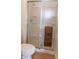 Clean bathroom with a sliding glass shower door and tile floor at 10781 Cedar Ridge Ln, Brownsburg, IN 46278