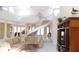 Open living room with a spiral staircase and high ceilings at 10781 Cedar Ridge Ln, Brownsburg, IN 46278