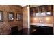 Home office features built-in shelving and granite countertop at 10781 Cedar Ridge Ln, Brownsburg, IN 46278