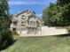 3-car garage and stucco home with large windows at 10781 Cedar Ridge Ln, Brownsburg, IN 46278