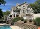 Two-story house with a brick facade, attached two-car garage, and a swimming pool at 10781 Cedar Ridge Ln, Brownsburg, IN 46278