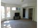 Spacious bedroom with large windows, a TV, and walk-in closet at 10781 Cedar Ridge Ln, Brownsburg, IN 46278